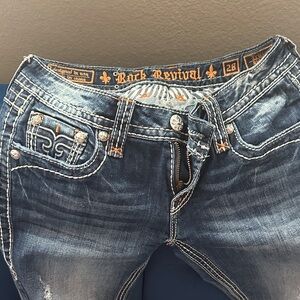 Rock Revival Women's Distressed Blue Jeans with Orange Accents